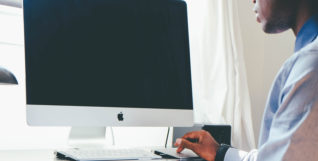 Man in front of computer