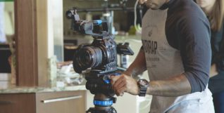 man-filming-media-industry